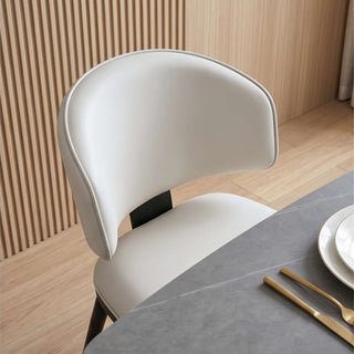 The Riviera Leather Dining Chair | Crease-Resistant | Sculptural Back-Hugging Form & Architectural Comfort (I)